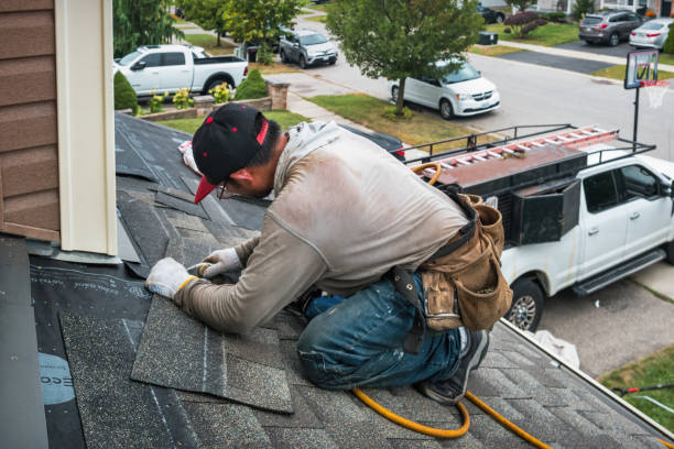 Professional Storm Damage Roof Repair technician working in Advance, IN